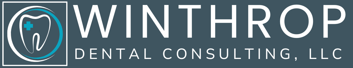 Partial view of a logo with letters 'NT' and text below.